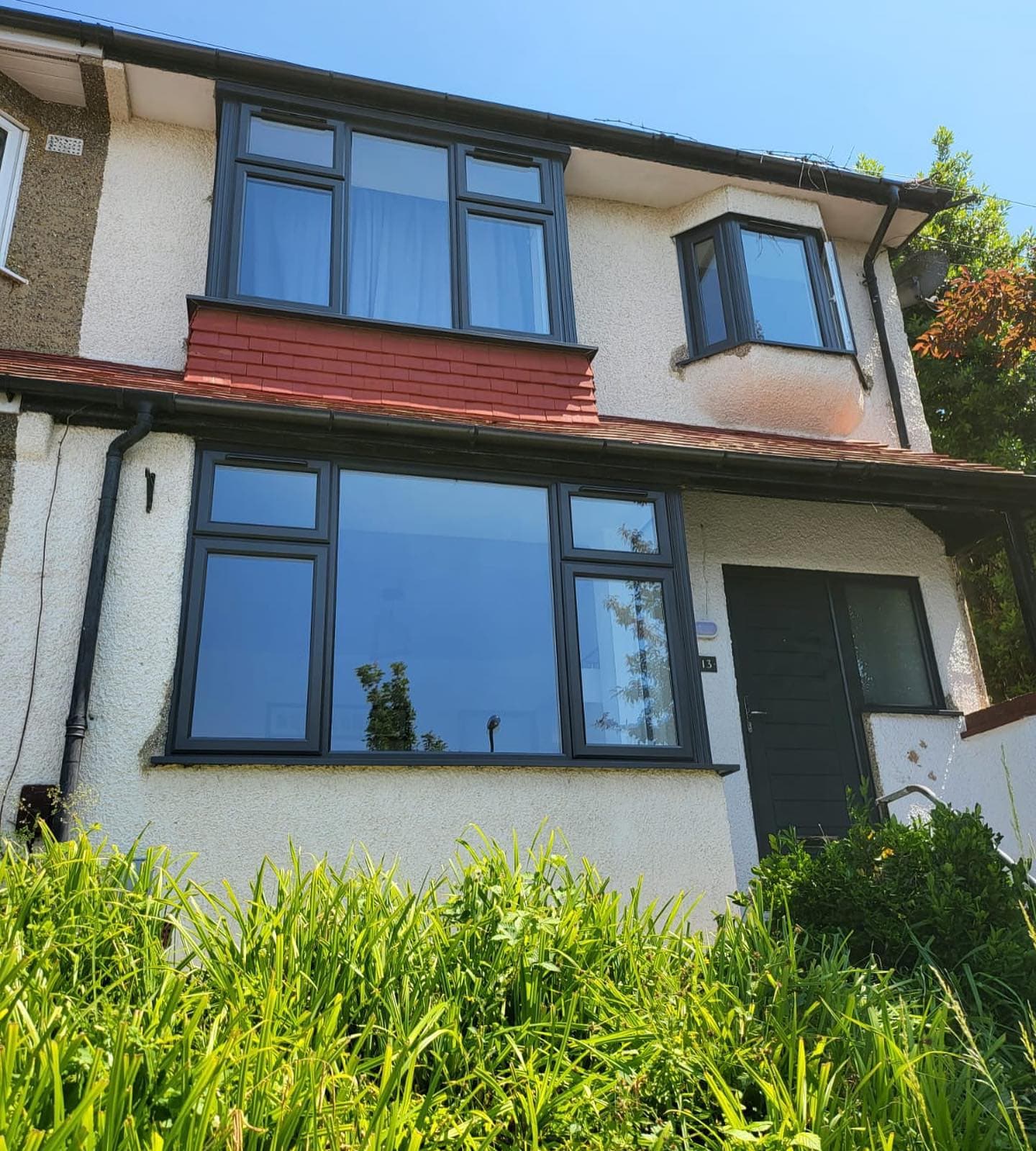 Anthracite aluminium windows on a 1930s semi, Surrey
