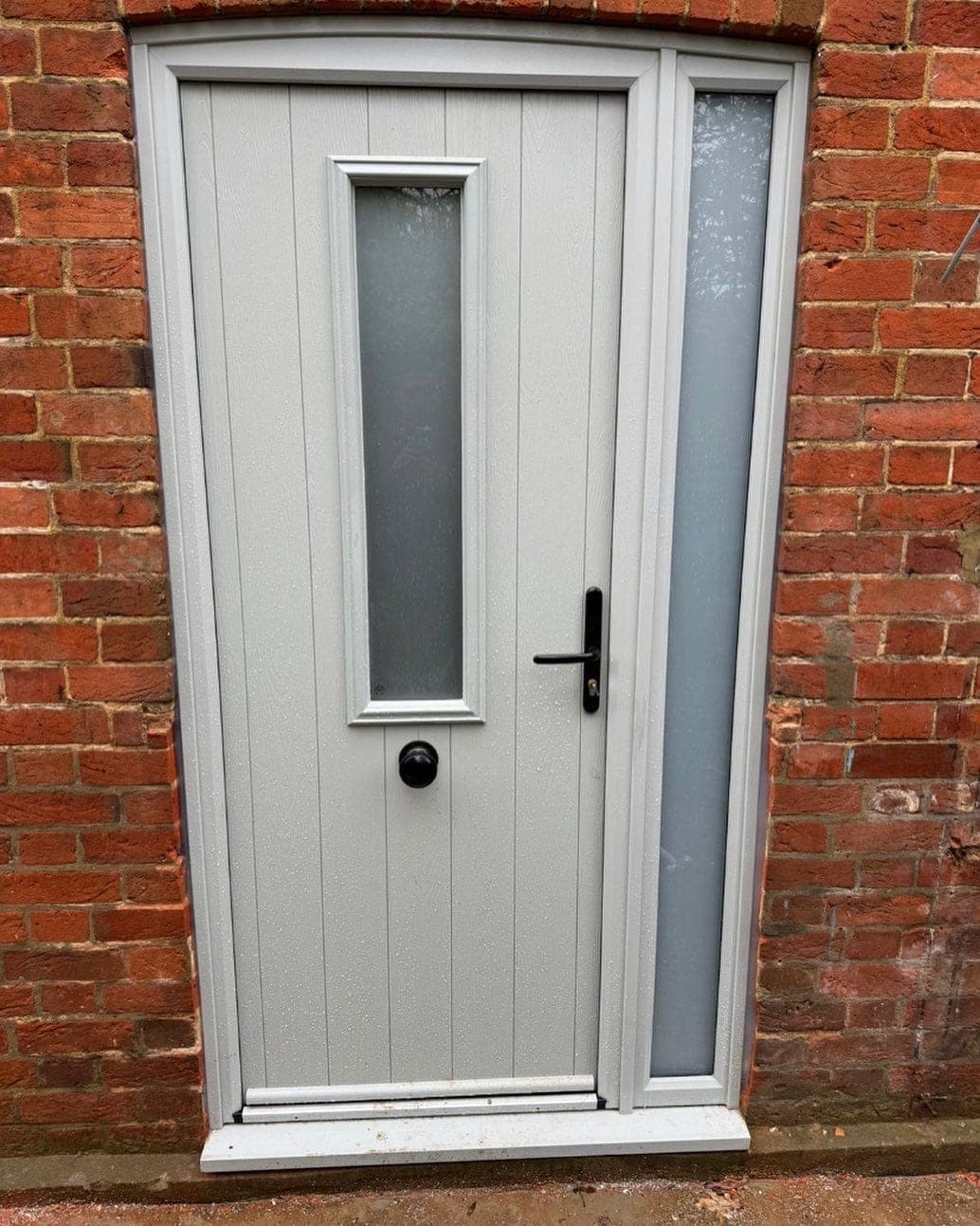 Light grey composite front door — Surrey, fitted by A1 Window Construction Ltd