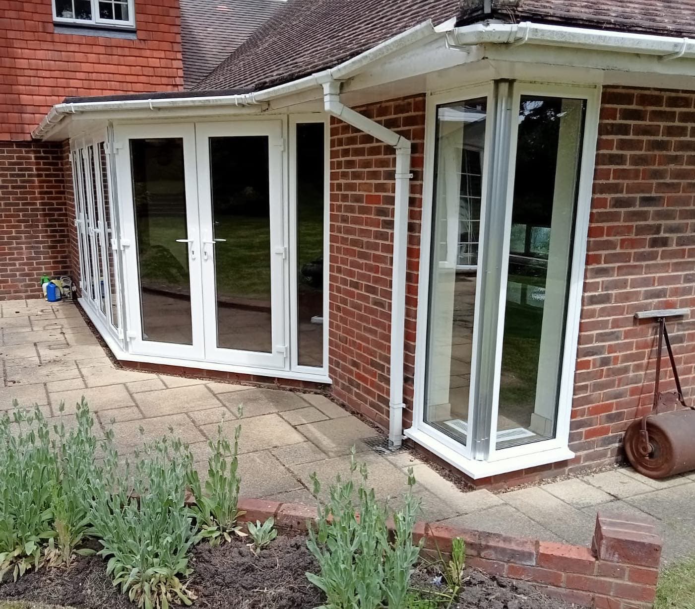 Lean-to conservatory with aluminium frames — Surrey, built by A1 Window Construction Ltd
