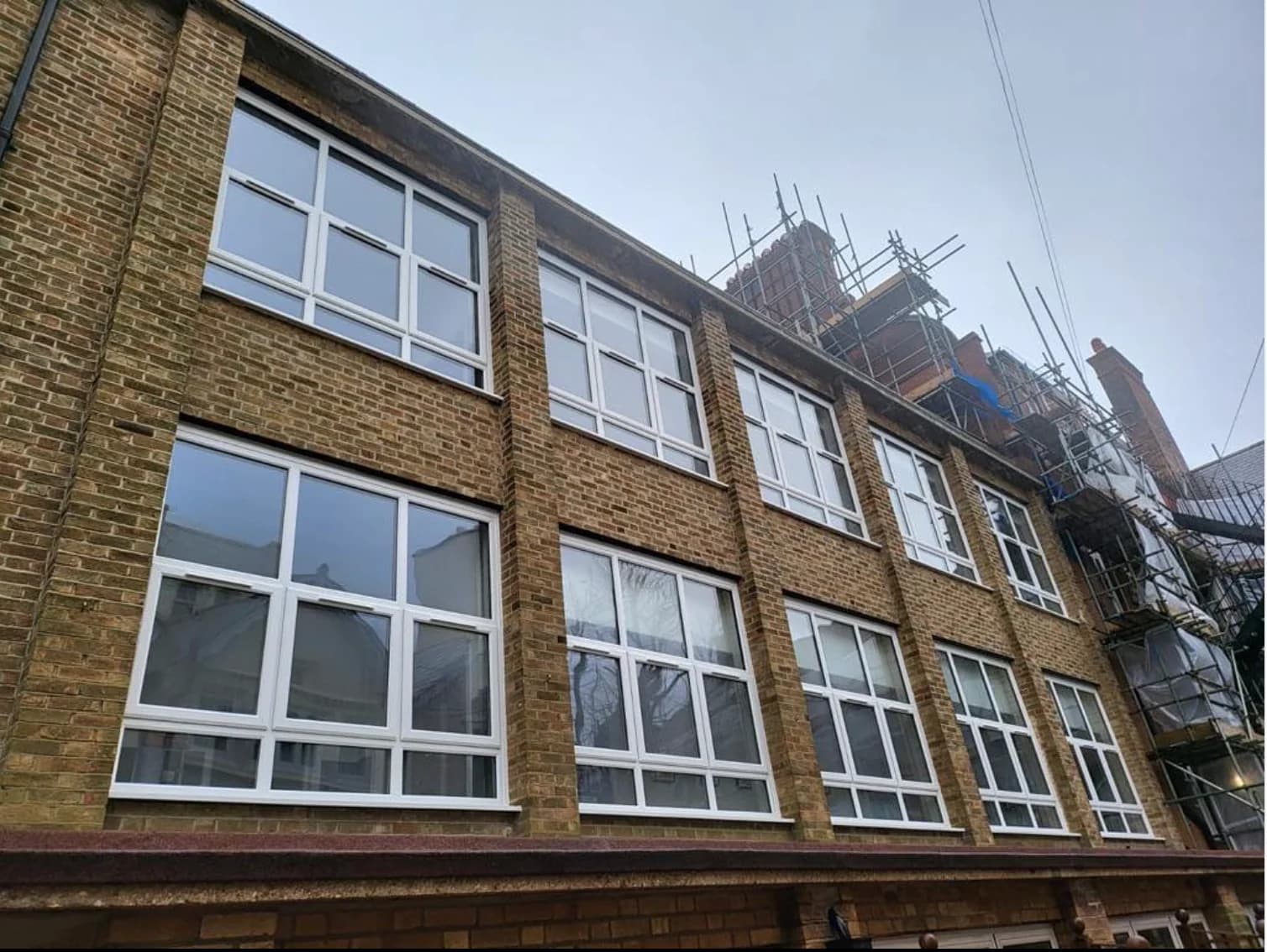 Multi-floor commercial glazing fit-out — aluminium windows and doors, London, by A1 Window Construction Ltd
