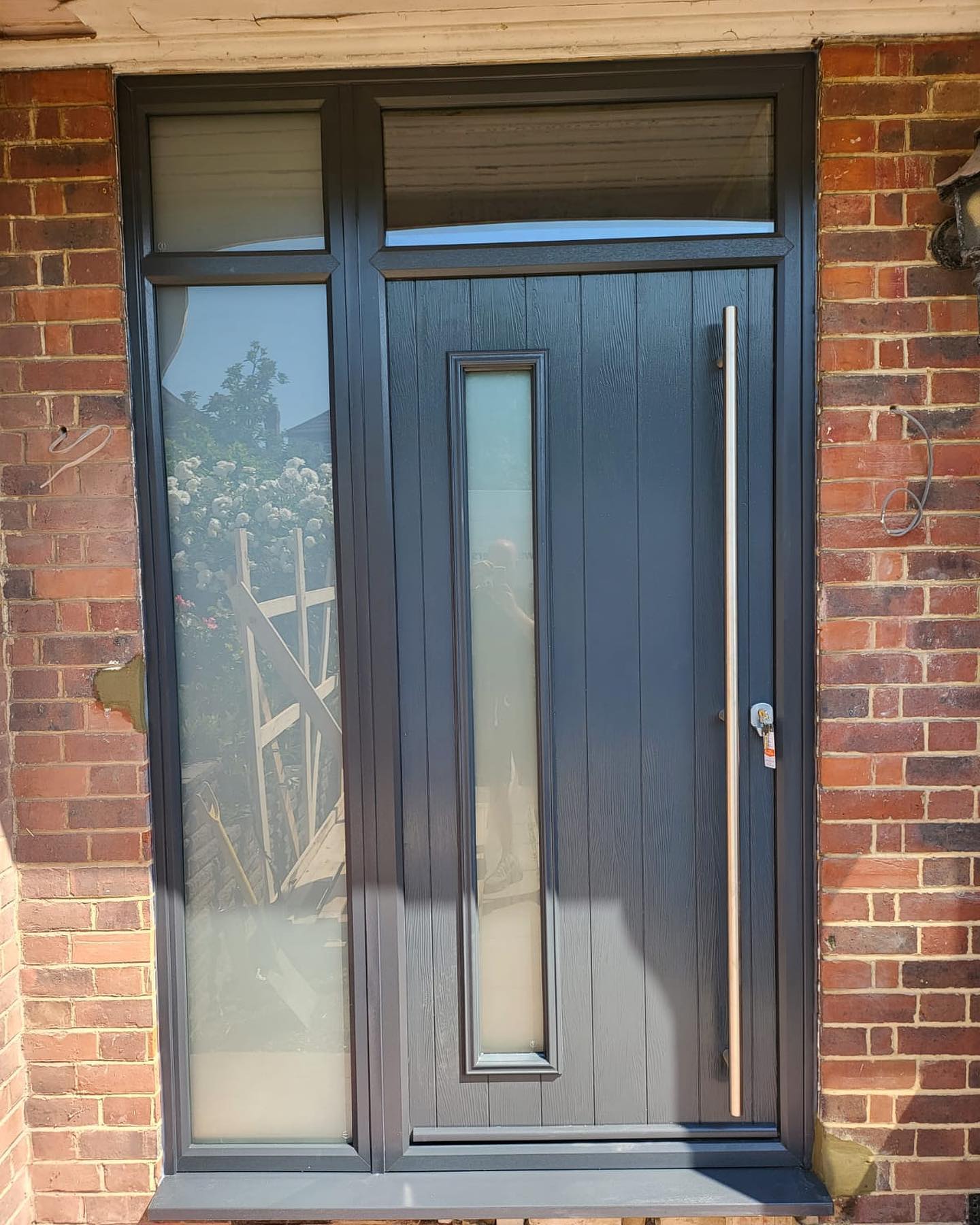 Anthracite composite front door on period red brick property — Cheam, Surrey, by A1 Window Construction Ltd