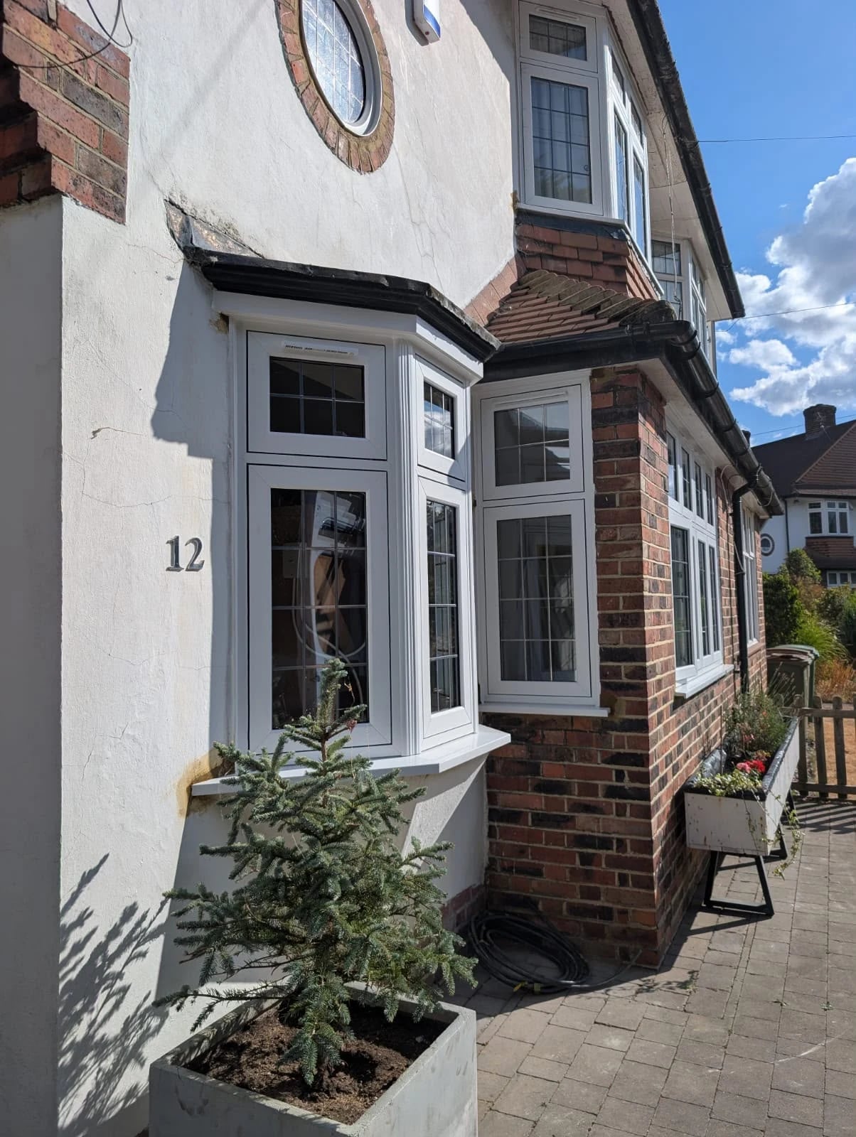 The bay and the corner window together on the front elevation