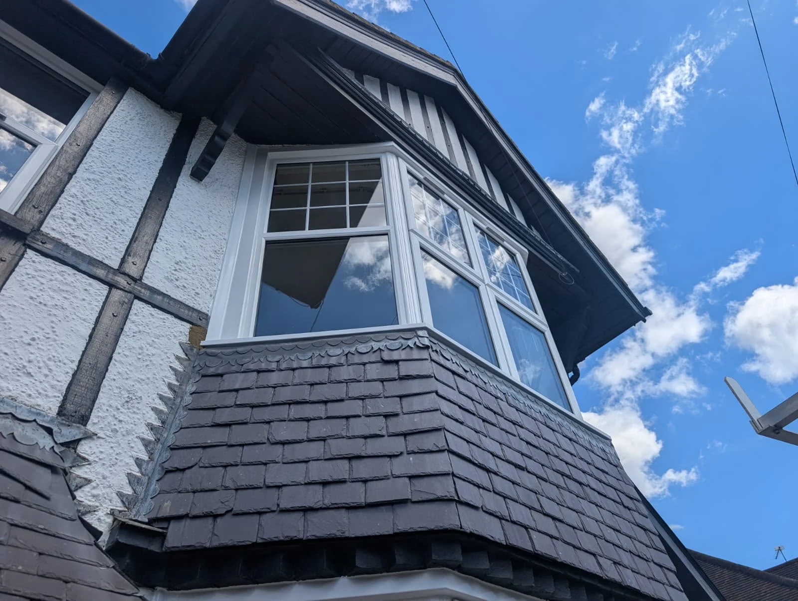 First-floor bay under the gable, seen from below