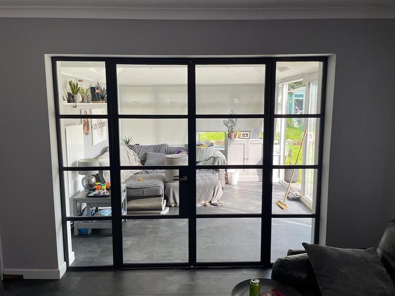Crittall-style steel door system installed — London, by A1 Window Construction Ltd